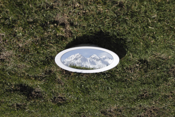 Mountain reflexion in a plate 2012, photography
